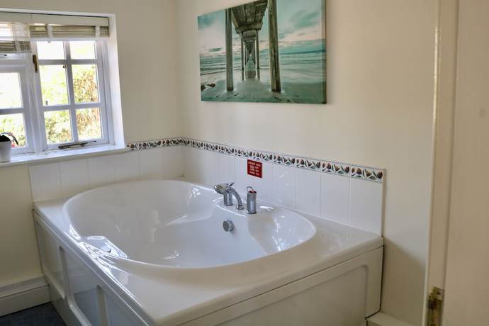 Imagen de la habitación del Hotel The Cottage. Foto 15