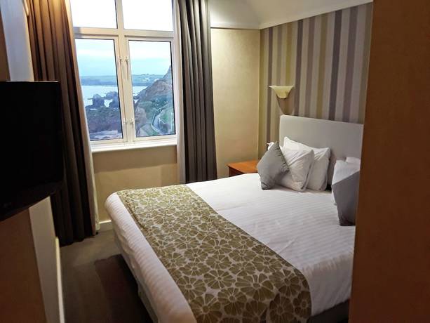 Imagen de la habitación del Hotel The Cottage. Foto 7