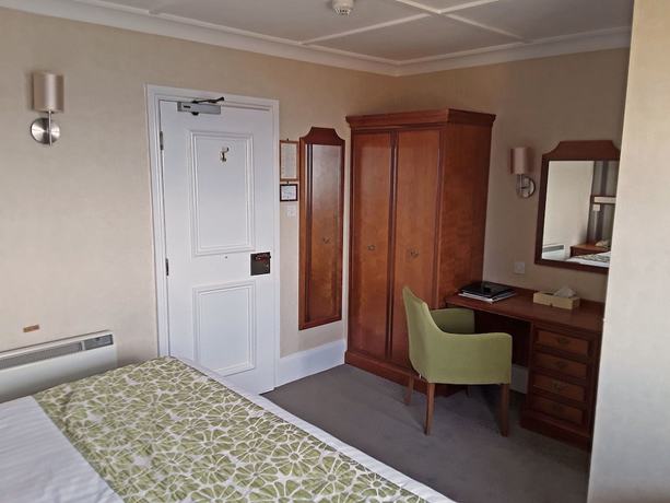 Imagen de la habitación del Hotel The Cottage. Foto 10