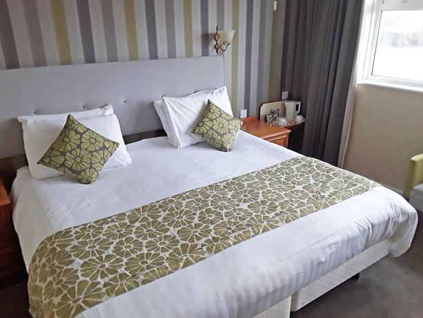 Imagen de la habitación del Hotel The Cottage. Foto 11