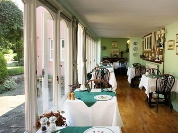 Imagen del bar/restaurante del Hotel The Cottage Guest House. Foto 9