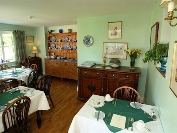 Imagen del bar/restaurante del Hotel The Cottage Guest House. Foto 10