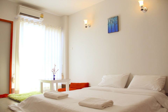 Imagen de la habitación del Hotel The Cottage Lampang. Foto 7