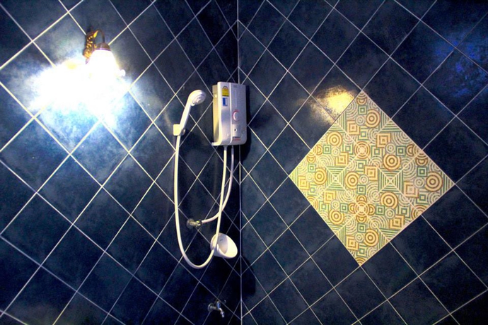 Imagen de la habitación del Hotel The Cottage Lampang. Foto 8