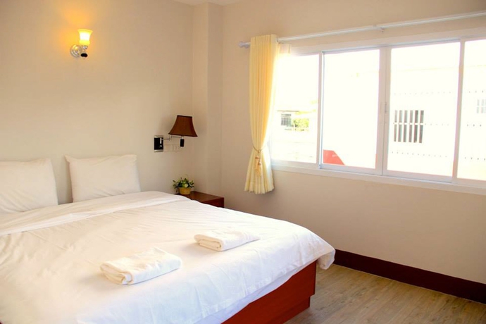 Imagen de la habitación del Hotel The Cottage Lampang. Foto 9