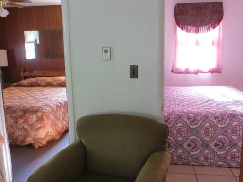 Imagen de la habitación del Hotel The Cottage Resort. Foto 12