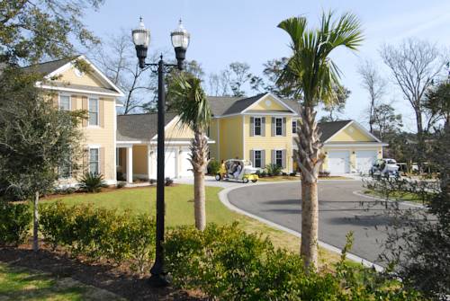 Imagen de la habitación del Hotel The Cottages At North Beach Plantation. Foto 9