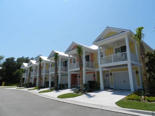 Imagen de la habitación del Hotel The Cottages At North Beach Plantation. Foto 11