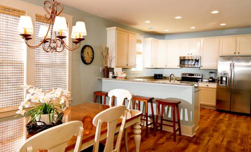 Imagen de la habitación del Hotel The Cottages At North Beach Plantation. Foto 13
