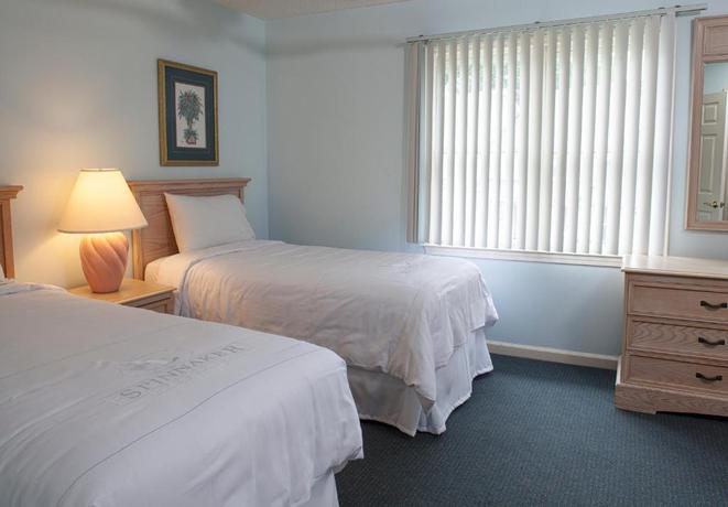 Imagen de la habitación del Hotel The Cottages By Spinnaker Resorts. Foto 2