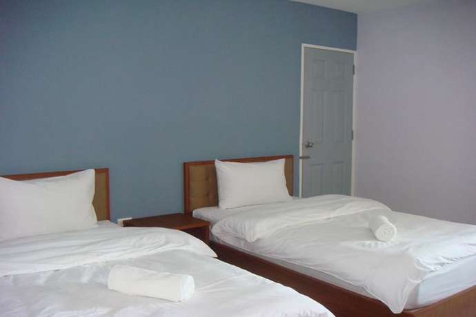Imagen de la habitación del Hotel The Cotton Apartment and Resort. Foto 12