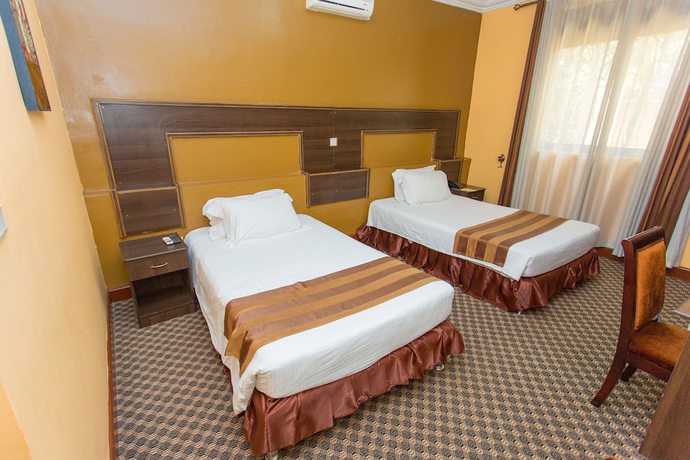 Imagen de la habitación del Hotel The Country Inn. Foto 4