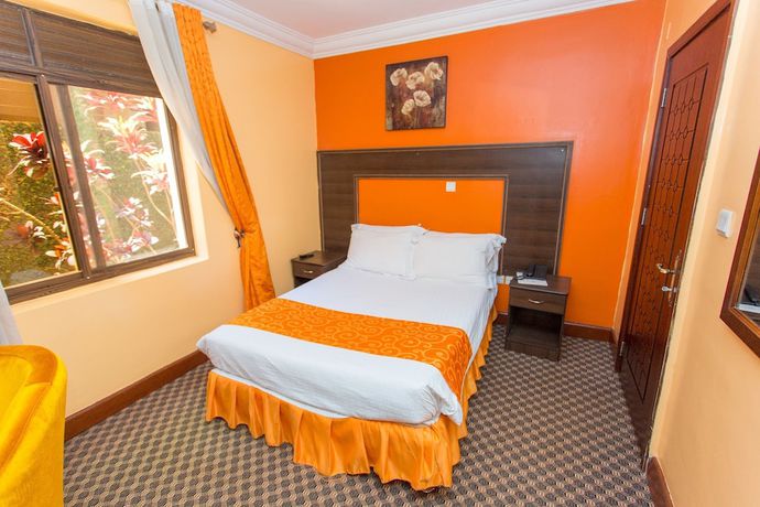 Imagen de la habitación del Hotel The Country Inn. Foto 7