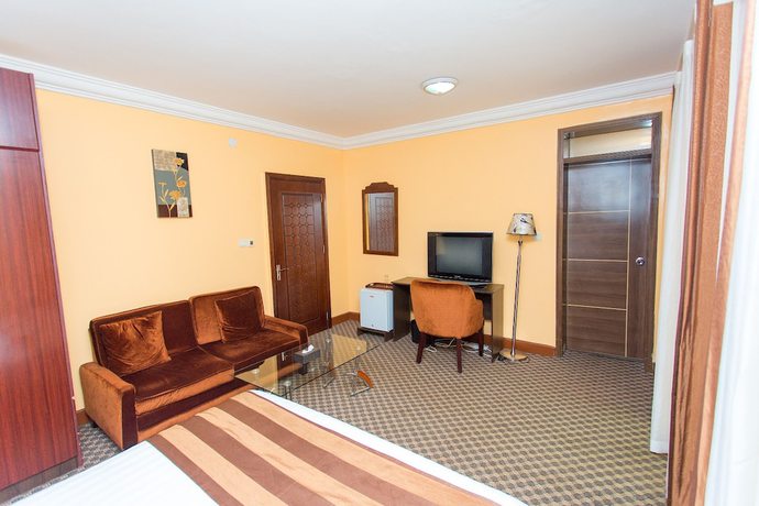 Imagen de la habitación del Hotel The Country Inn. Foto 9