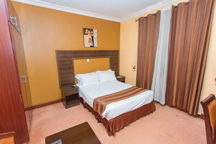 Imagen de la habitación del Hotel The Country Inn. Foto 10