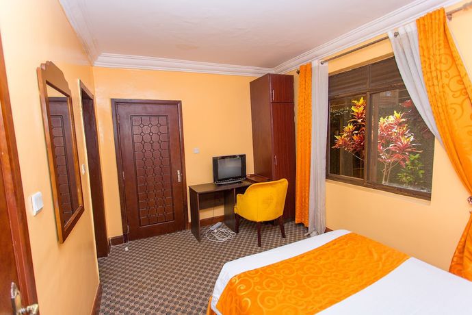 Imagen de la habitación del Hotel The Country Inn. Foto 14