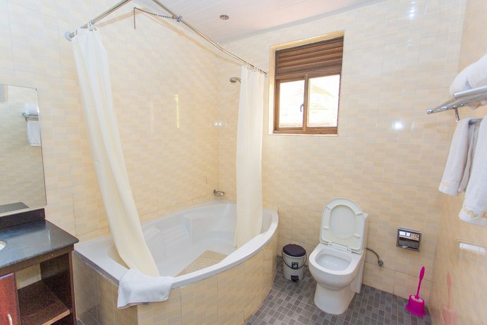 Imagen de la habitación del Hotel The Country Inn. Foto 17