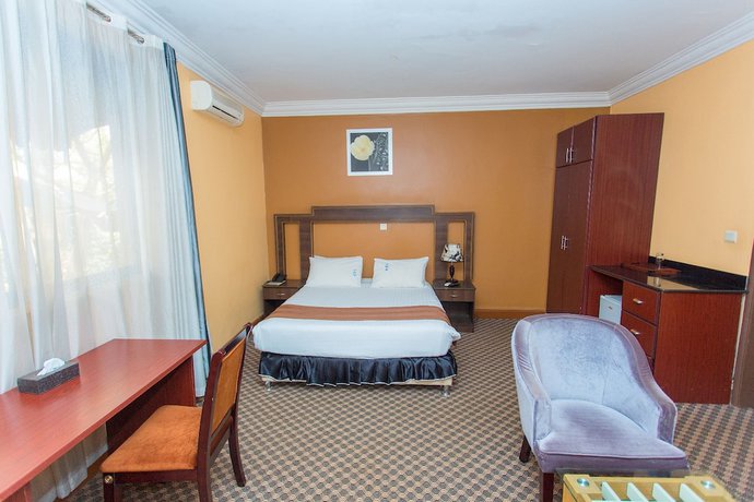 Imagen de la habitación del Hotel The Country Inn. Foto 19