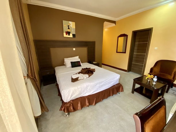 Imagen de la habitación del Hotel The Country Inn by Smart Haven. Foto 10