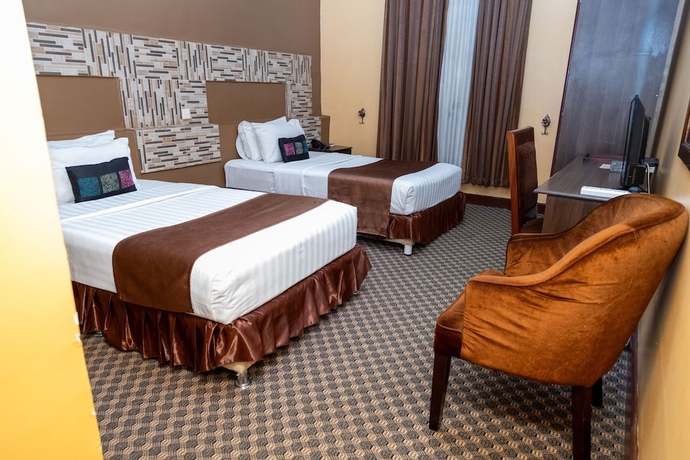 Imagen de la habitación del Hotel The Country Inn by Smart Haven. Foto 13