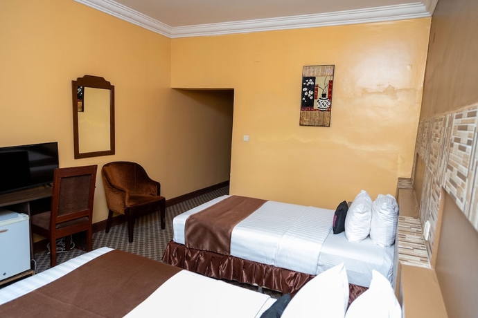 Imagen de la habitación del Hotel The Country Inn by Smart Haven. Foto 14