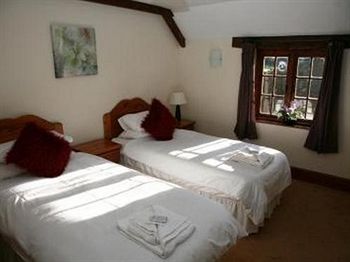 Imagen de la habitación del Hotel The Countryman Inn. Foto 6