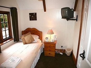 Imagen de la habitación del Hotel The Countryman Inn. Foto 7