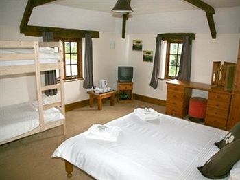 Imagen de la habitación del Hotel The Countryman Inn. Foto 8