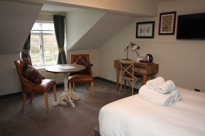 Imagen de la habitación del Hotel The Countryman Inn. Foto 4