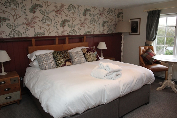 Imagen de la habitación del Hotel The Countryman Inn. Foto 7