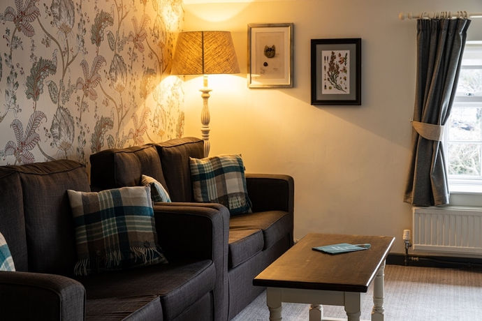 Imagen de la habitación del Hotel The Countryman Inn. Foto 9