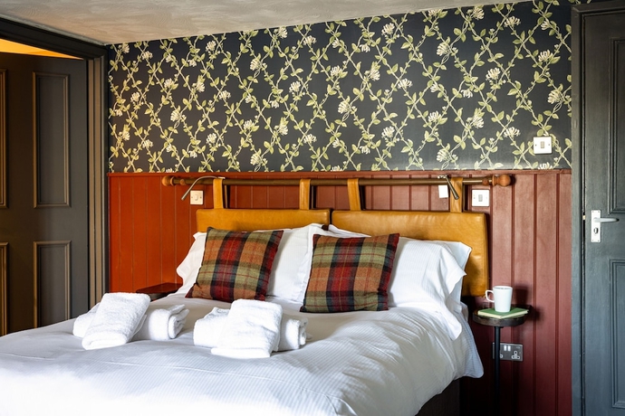Imagen de la habitación del Hotel The Countryman Inn. Foto 10