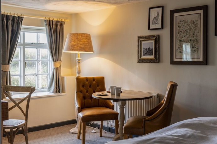 Imagen de la habitación del Hotel The Countryman Inn. Foto 14