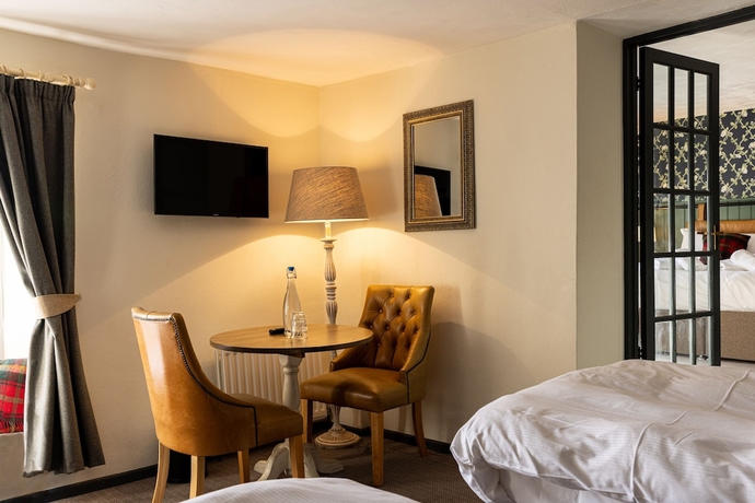 Imagen de la habitación del Hotel The Countryman Inn. Foto 16