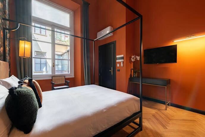 Imagen de la habitación del Hotel The Couper Castello. Foto 16