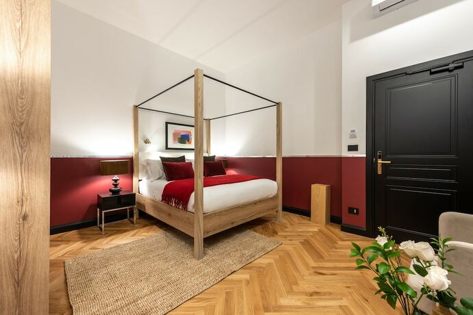 Imagen de la habitación del Hotel The Couper Castello. Foto 17