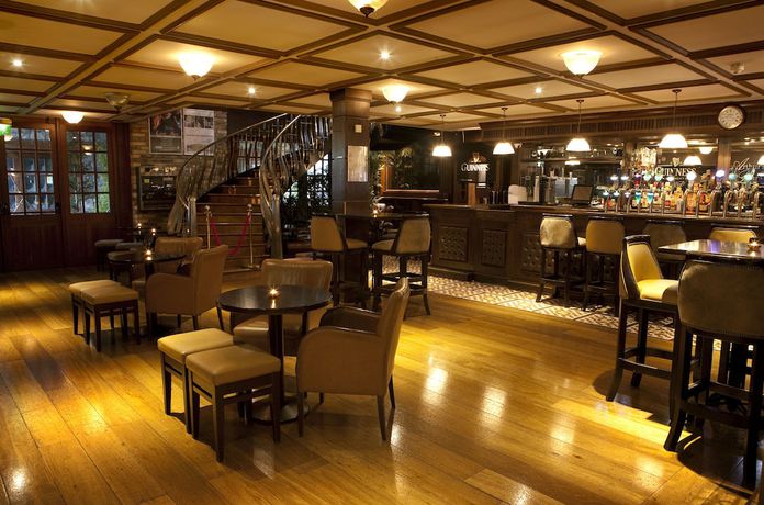 Imagen del bar/restaurante del Hotel The Court Yard. Foto 10