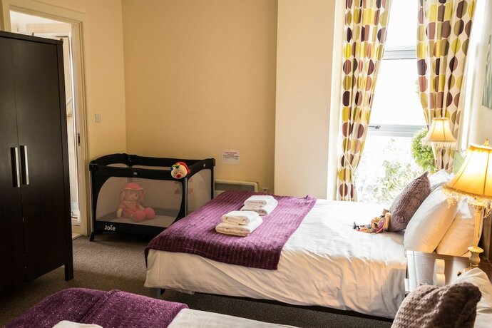 Imagen de la habitación del Hotel The Courtyard Apartments. Foto 15