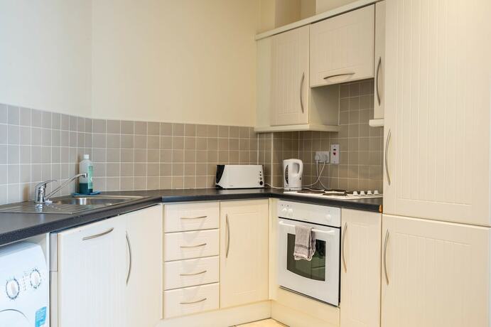 Imagen de la habitación del Hotel The Courtyard Apartments. Foto 18