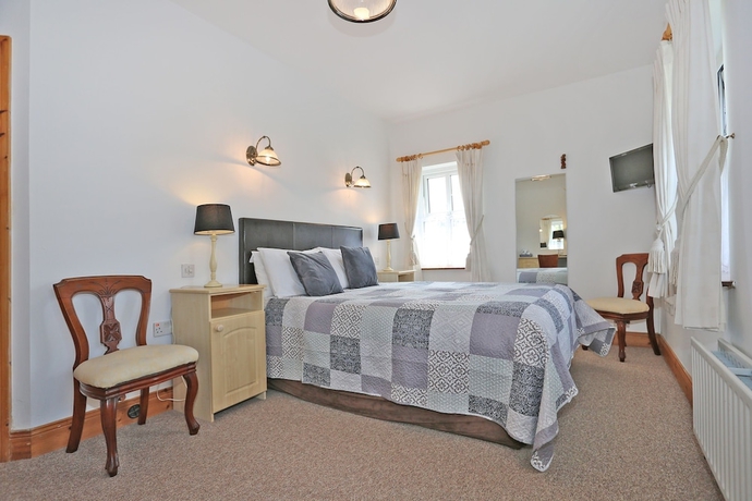 Imagen de la habitación del Hotel The Courtyard BandB. Foto 4