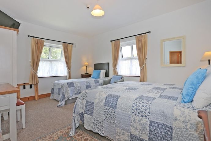 Imagen de la habitación del Hotel The Courtyard BandB. Foto 6