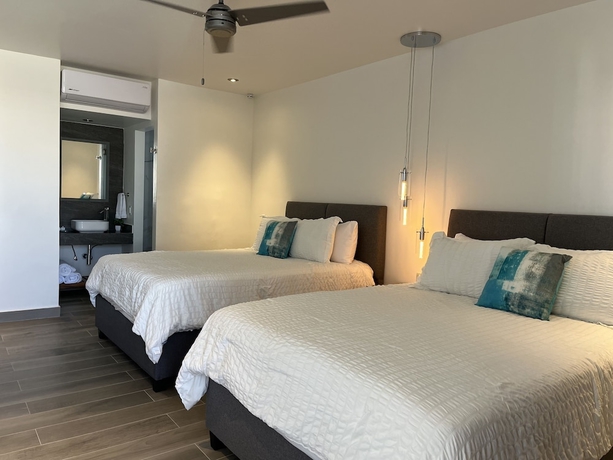 Imagen de la habitación del Hotel The Cove Boutique Adults Only. Foto 5