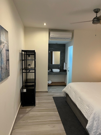 Imagen de la habitación del Hotel The Cove Boutique Adults Only. Foto 10
