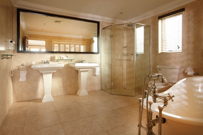 Imagen de la habitación del Hotel The Cove Suites At Blue Waters Resort and Spa. Foto 4