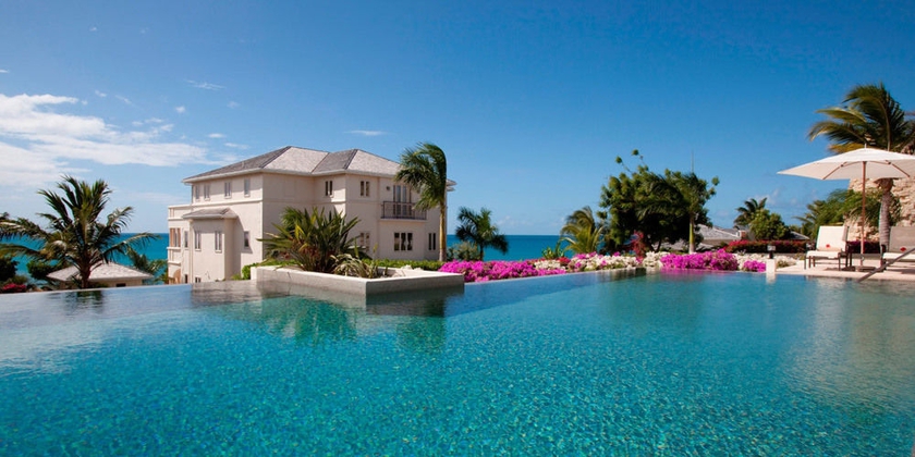 Imagen de la piscina del Hotel The Cove Suites At Blue Waters Resort and Spa. Foto 14