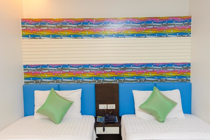 Imagen de la habitación del Hotel The Cozi Inn. Foto 6