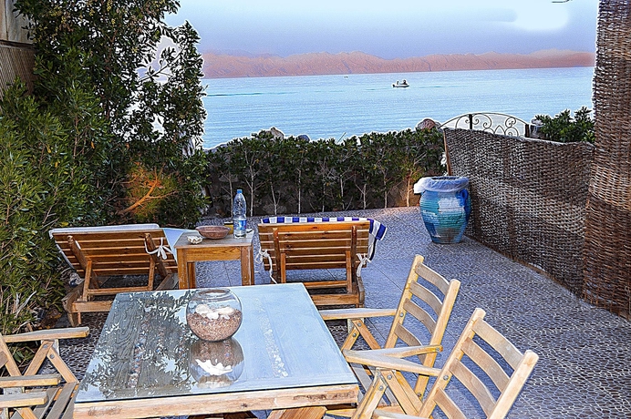 Imagen de la habitación del Hotel The Cozy Beach House. Foto 13