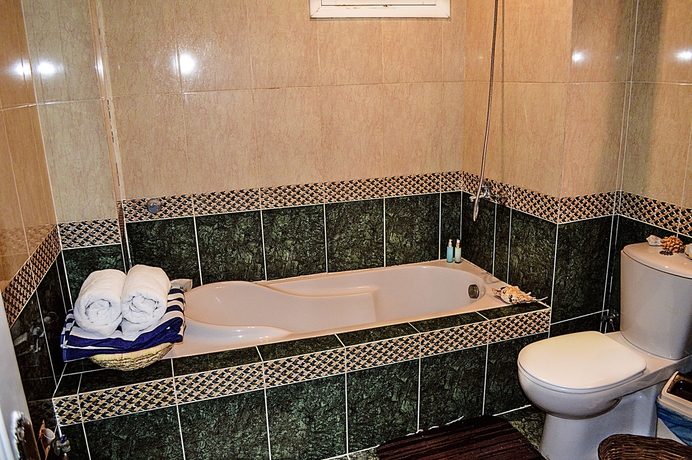 Imagen de la habitación del Hotel The Cozy Beach House. Foto 15