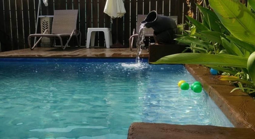 Imagen de la piscina del Hotel The Cozy. Foto 9