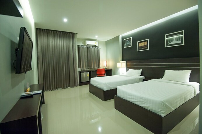 Imagen de la habitación del Hotel The Cozy Nest Boutique Rooms. Foto 19